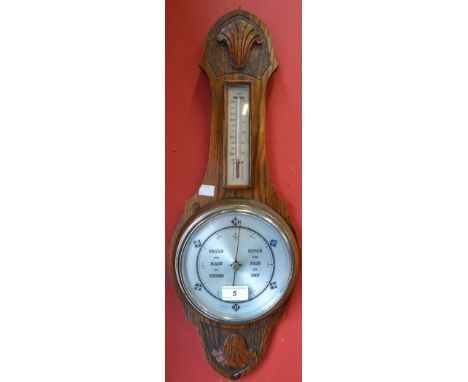 An Edwardian oak aneroid barometer