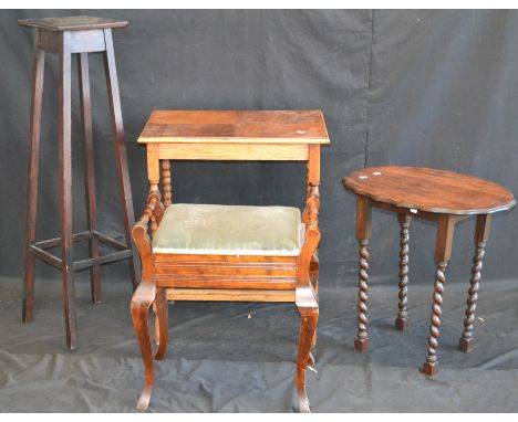 An oak occasional table, rectangular top, bobbin turned legs; a walnut quarter veneered oval occasional table; an oak shaped 