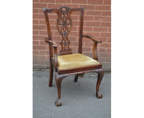 A George III Chippendale style mahogany armchair, ball and claw feet