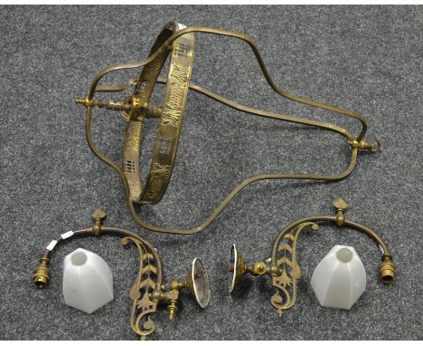 A pair of 19th century cast brass light sconces with opaque glass shades; a brass ceiling light