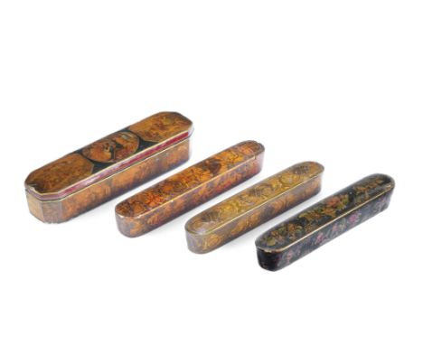 Four Qajar lacquer penboxes (qalamdan) Persia, 19th Centurycomprising three of typical form with rounded ends and sliding tra