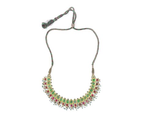 A gem-set enamelled gold necklace North India, 20th Centurycomprising a series of rectangular elements with suspended tear dr