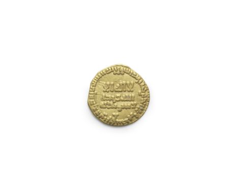 An Abbasid gold dinar from the reign of Harun al-Rashid (AD 786-809) Baghdad, dated AH 171/ AD 787-788with three lines of ins