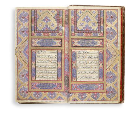An illuminated Qur'an Qajar Persia, 19th CenturyArabic and Persian manuscript on paper, 332 leaves, 13 lines to the page writ