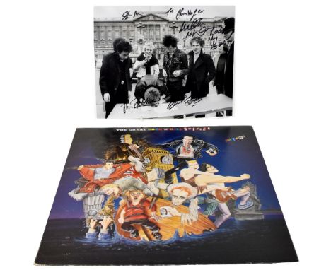 THE SEX PISTOLS; a black and white photograph inscribed 'To Christopher' and bearing signatures of the band members, also an 