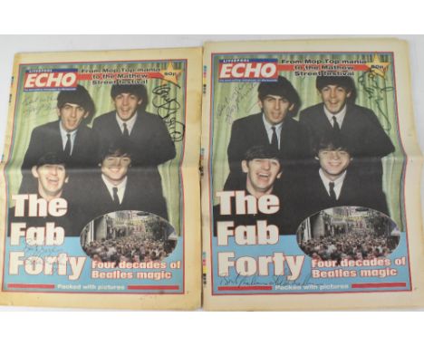 THE BEATLES INTEREST; two copies of the Liverpool Echo, each bearing three signatures including George Martin and Allen Willi