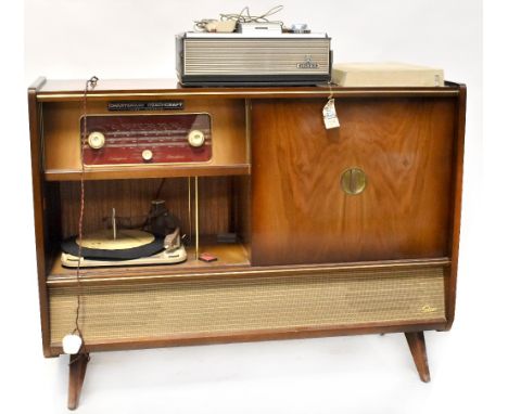 A Charterway Coachcraft, Formby, Lancashire walnut veneered radiogram with integral tuner, turntable, glazed section and spea