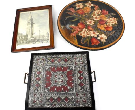 A Victorian tapestry and beadwork cloth enclosed in an ebonised square tray with brass handles, a decorative print 'Venice: T