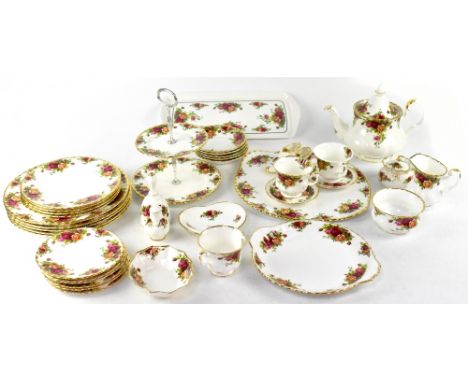 A collection of Royal Albert 'Old Country Roses' teaware to include teapot, side plates, plates, cups, saucers, salt and pepp