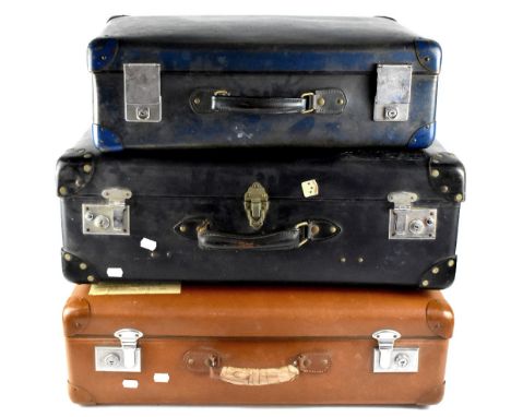 Two vintage card suitcases, one navy, one tan, with old paper travel label 'Samanda World Travel', length of each 66cm (2).