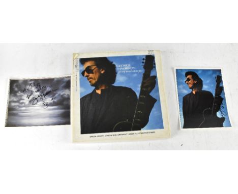 GEORGE HARRISON; a boxed single 'Got My Mind Set on You/Lay His Head' with two photographs, both bearing the signatures of Ge