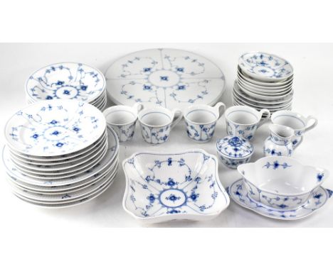 A quantity of Royal Copenhagen traditional blue and white tea and dinner ware to include dinner plates, side plates, cups, sa