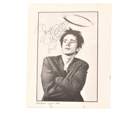 JOHNNY ROTTEN; a page from a book bearing signature of the star and further inscribed 'Woz here!!'.We have not authenticated 