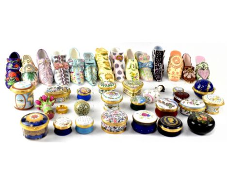 A collection of twenty Halcyon Days enamelled boxes to include Art Nouveau style decorative examples, floral examples, commem