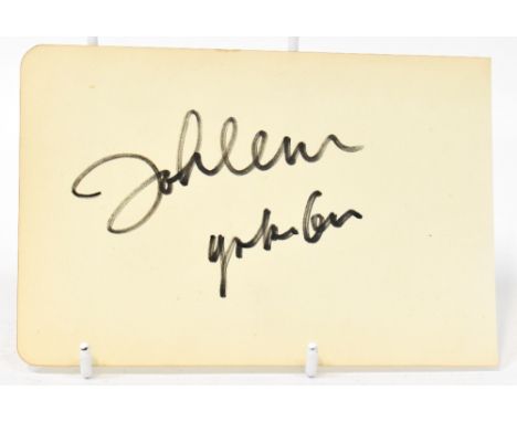 JOHN LENNON; a single page from an autograph book bearing the artist's signature. CONDITION REPORT This item comes from a ver