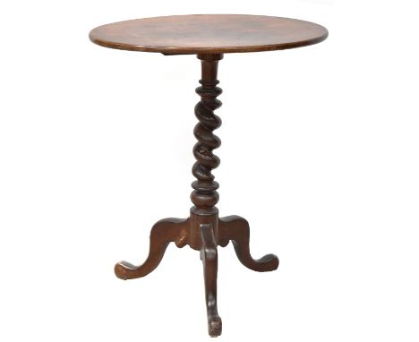 A Victorian mahogany oval tilt-top tripod occasional table, raised on a barleytwist column to three outswept supports, 69 x 5