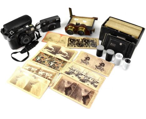 A Stereoscope and a quantity of vintage Stereoscope slides, various subjects to include topographical, interiors, children an