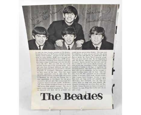 PAUL MCCARTNEY & JOHN LENNON; a torn page from a book bearing the signatures of Paul McCartney and John Lennon, along with Ma