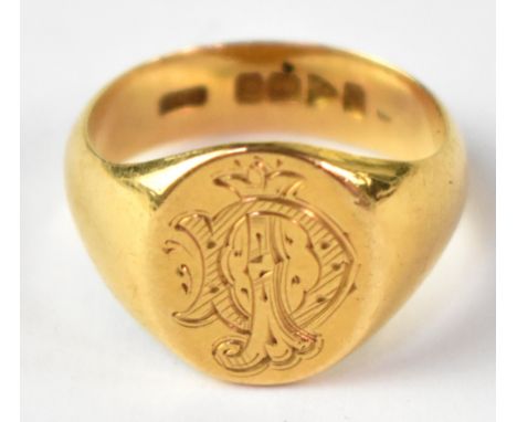 An 18ct yellow gold signet ring, initialled to to the top, size O, approx 7.9g.