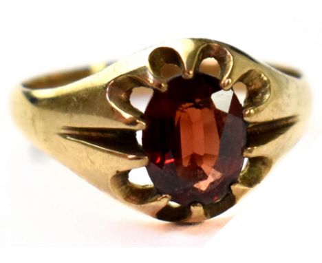 A gentlemen's vintage hallmarked 9ct gold signet ring with claw set garnet, size U, approx 4g.