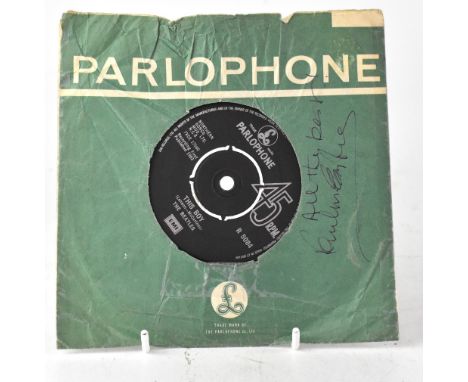 PAUL MCCARTNEY; a 45rpm single, The Beatles 'I Want to Hold Your Hand/This Boy' inscribed 'All the best' and bearing signatur