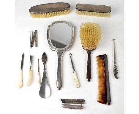 A group of various ladies' hallmarked silver and white metal vanity and writing items to include a hallmarked silver three-pi