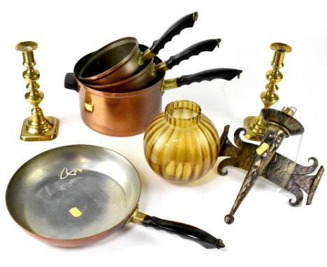 Various metalware to include a fold-out peacock-style brass fire guard, height 65cm, a set of four copper and brass pans by J