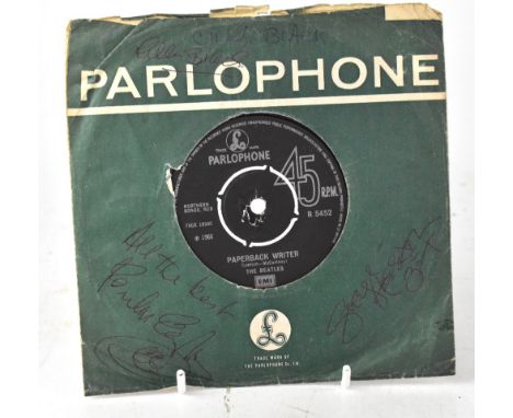 PAUL MCCARTNEY, GEORGE HARRISON & CILLA BLACK; a 45rpm single 'Paperback Writer/Rain', 1966, signed by Paul McCartney with a 
