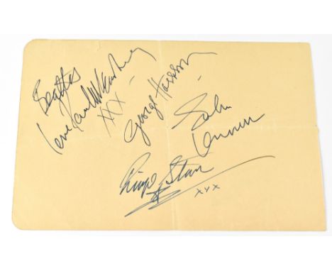 THE BEATLES; a page from an autograph book bearing all four signatures, 'Love Paul McCartney xxx', George Harrison, John Lenn