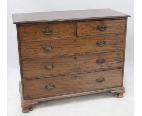 A 19th century mahogany chest of two short over three long graduated drawers with brass swan neck drop handles, on ogee brack
