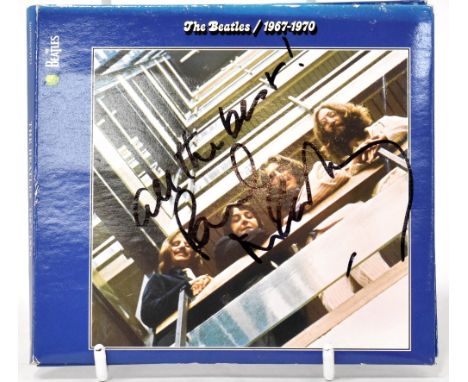 PAUL MCCARTNEY; 'The Beatles 1967-1970' CD bearing the signature of Paul McCartney and inscribed 'All the best!'. CONDITION R