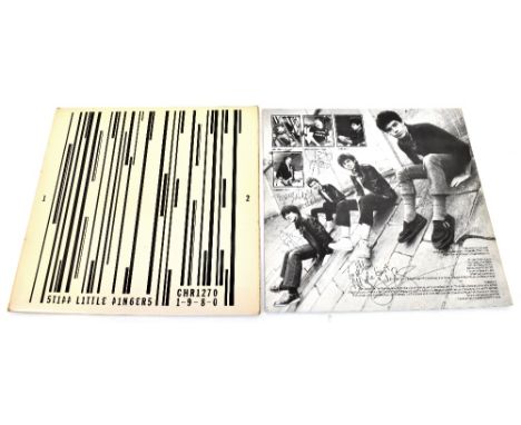 STIFF LITTLE FINGERS; related items to include 'Out of Our Skulls', two signed singles, 'Suspect Device' and 'Just Fade Away'