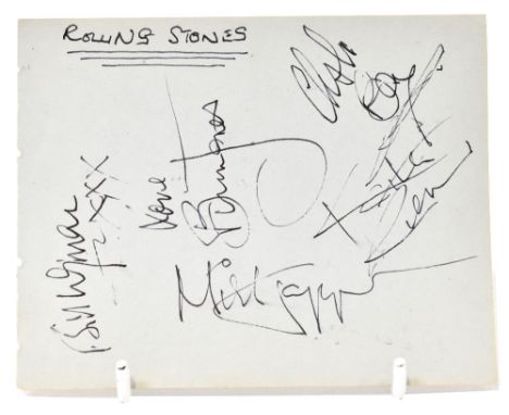 THE ROLLING STONES; a page from an autograph book bearing the signatures of Mick Jagger, Keith Richards, Brian Jones, Bill Wy