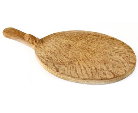 Robert 'Mouseman' Thompson; a carved oval cheese board with typical carved mouse to the handle, length 39.5cm, width 20cm. CO