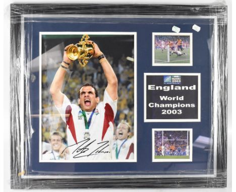MARTIN JOHNSON; a signed photograph of Martin Johnson lifting the winners' cup aloft during the Rugby World Cup, 2003 Champio