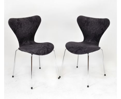 Fritz Hansen; a set of eight retro Danish upholstered dining chairs with chrome bases and a similar white oval fixed top dini