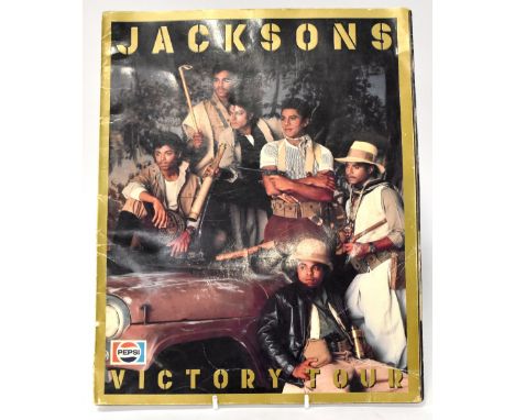 THE JACKSONS; a Victory Tour programme bearing five signatures comprising Michael Jackson, Marlon Jackson, Randy Jackson, Tit