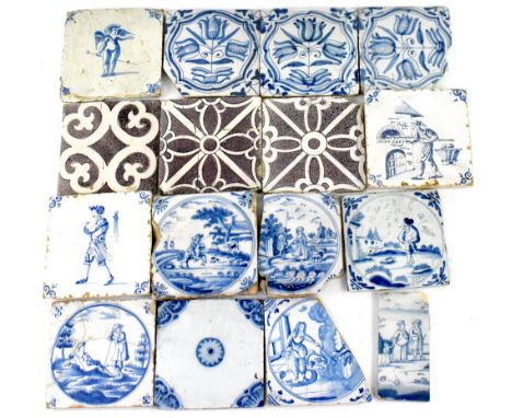 A collection of sixteen 18th century and later tin glazed tiles to include three manganese geometric examples, some blue and 
