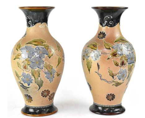 ROYAL DOULTON; a pair of early 20th century Doulton Slater baluster vases, brown dip glaze necks to textured body with raised