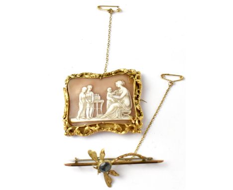 A vintage 9ct gold dragonfly brooch, the body with a bezel set blue stone and safety chain together with a 19th century yello
