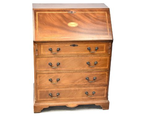 An Edwardian-style reproduction inlaid and cross-banded walnut bureau, the fall-front enclosing a fitted interior and a gilt 