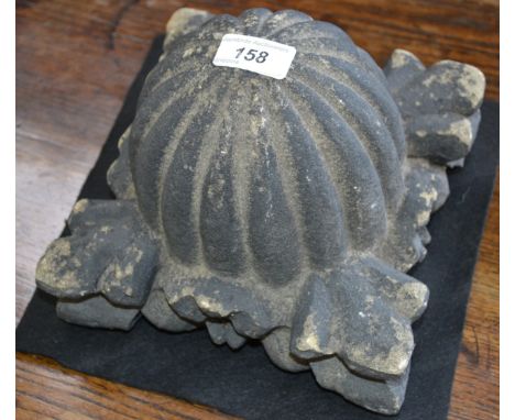 A post-Medieval stone finial, fluted dome above acanthus angles, 21cm wide