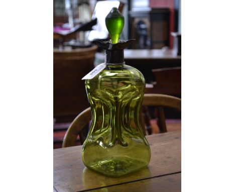 A Victorian green glass waisted decanter