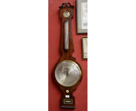 A George IV mahogany wheel barometer, signed to the level Linnell, London, 24cm circular silvered dial, hygrometer, mercury t