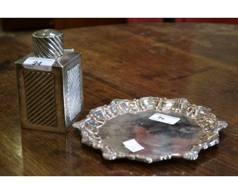 A Sheffield plated card tray, bearing armorial; a plated tea caddy, Cattaneu & Co., Leeds (2)