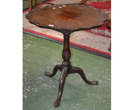 A George III mahogany and fruitwood tripod occasional table, piecrust top on birdcage support, baluster column, cabriole legs