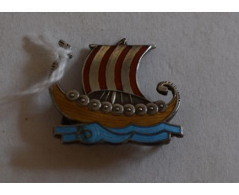 A Norwegian silver and enamel brooch, in the form of a Viking longship, Andresen and Scheinpflug, some damage to the enamel, 