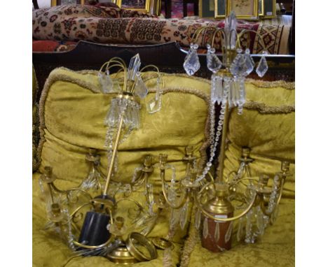 A pair of brass and glass lustre drop six light chandeliers, 75 cm high (2)   Condition report  Modern