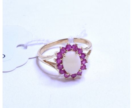 A 9ct gold, opal and ruby ring, approx. ring size N½