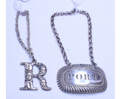 An early 19th century silver decanter label, PORT, John Wrangham, London 1821, 4.5 cm wide, and another, R (for Rum), Joseph 